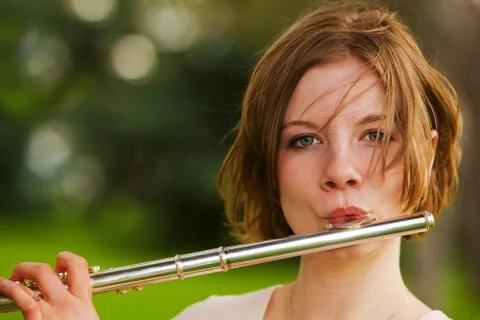 Playing the flute Stock Photos