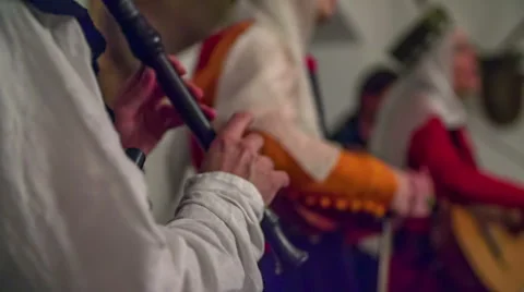 Playing a flute very nicely Stock Footage 63081335
