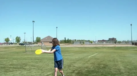 Playing Frisbee in Sun Video stock 12610717