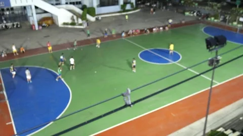 Playing futsal in the field Stock Footage 289662716