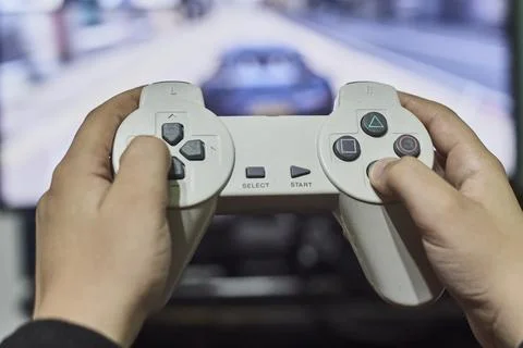 Playing game on console Stock Photos