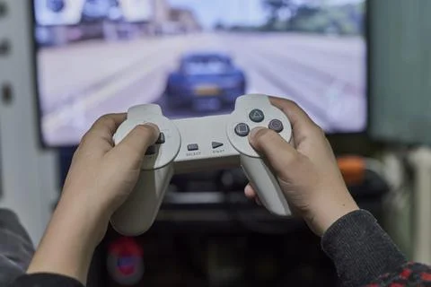 Playing game on console Stock Photos