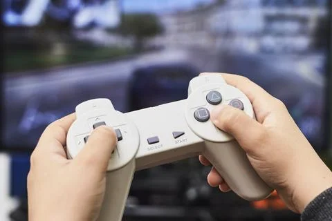 Playing game on console Stock Photos
