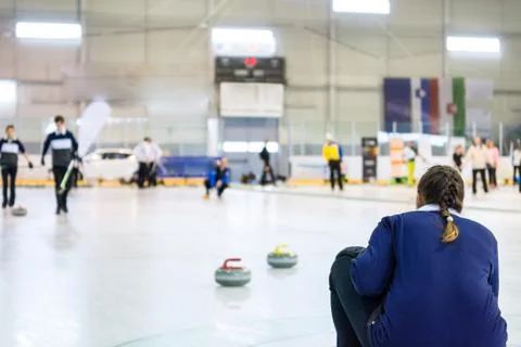 Playing a game of curling. Stock Photos