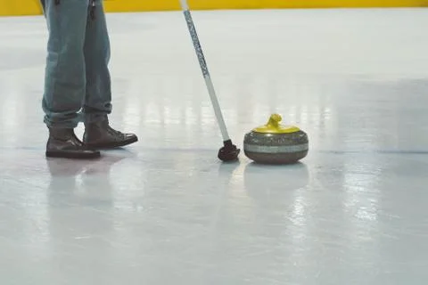 Playing a game of curling. Stock Photos