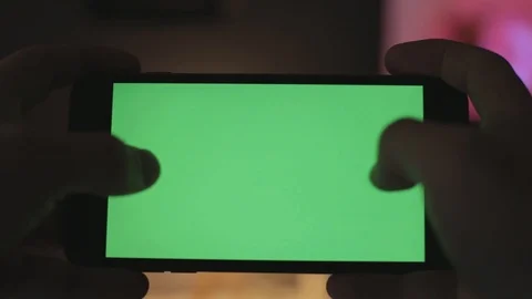 Playing Game With Gestures Tapping And Tilting.Smartphone Green Screen Stock Footage 123079238
