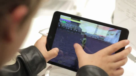 Playing Game With Ipad Air Video stock 36289217