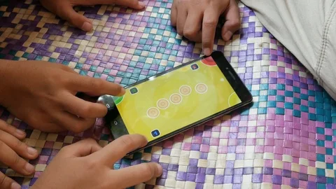 Playing Game On A Smartphone Stock Footage 120620994