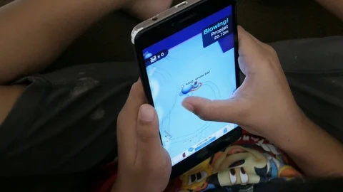 Playing Game On A Smartphone Stock Footage 120621058