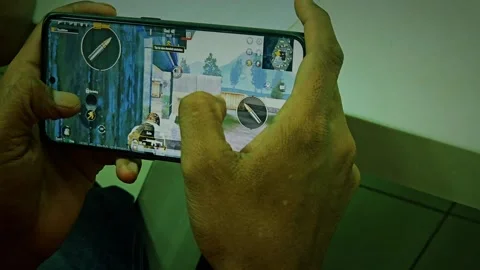 Playing game on smartphone Video stock 314614578