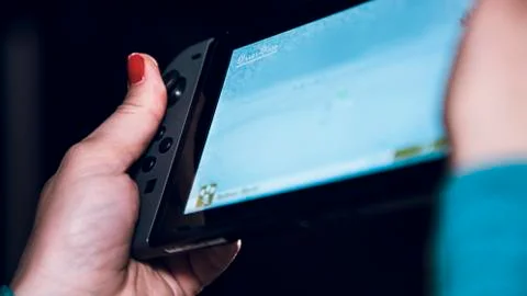 Playing game on switch 스톡 사진