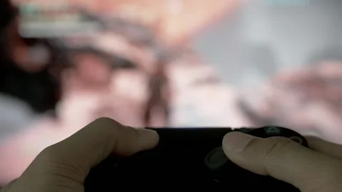 Playing a Game on the video game Console Stock Footage 239019817