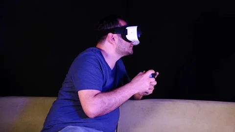 Playing games console and vr glasses Stock Footage 248466193