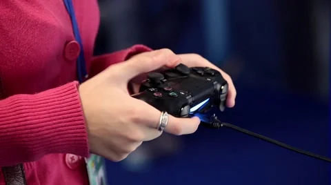 Playing games console close up, girl playing video game with joystick Stock Footage 55456776
