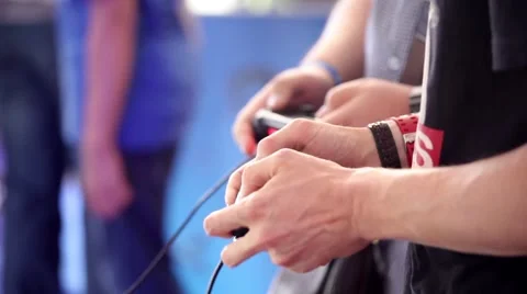Playing games console close up, man playing video game with joystick Stock Footage 52583134