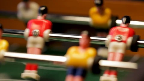 Playing games foosball table game close up. Teamwork concept scoring a goal in t Stock Footage 123364866