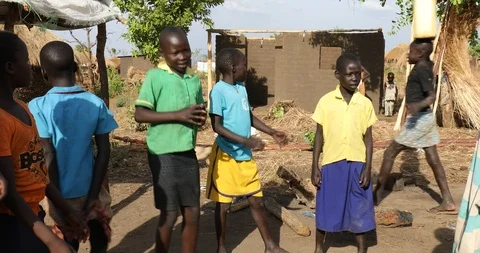 Playing Games at a Refugee Settlement Stock Footage 93914528