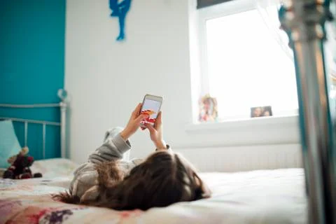 Playing Games on Smartphone Stock Photos