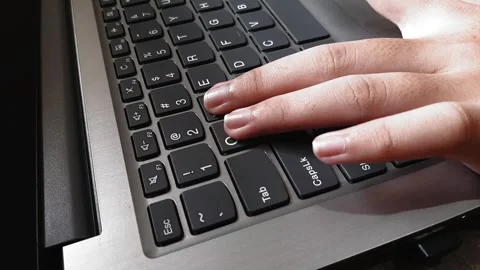 Playing games using a laptop keyboard Stock Footage 285919121