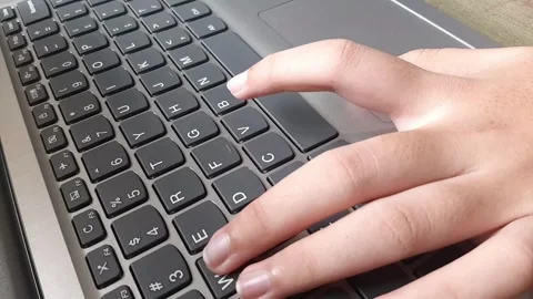 Playing games using a laptop keyboard Stock Footage 285919122
