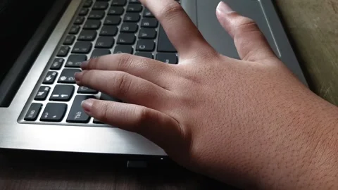 Playing games using a laptop keyboard Stock Footage 285919157