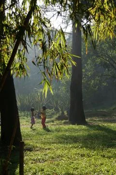 Playing in Garden Stock Photos