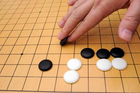 Playing go game Stock Photos