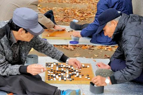 Playing go Stock Photos