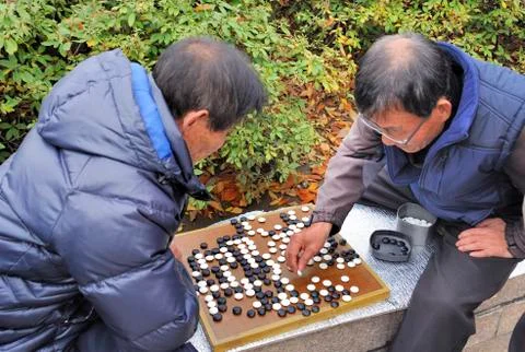 Playing go Stock Photos