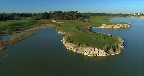 Playing Golf on Beautiful Golf Course, Golfers, Aerial Drone Stock Footage 104507955