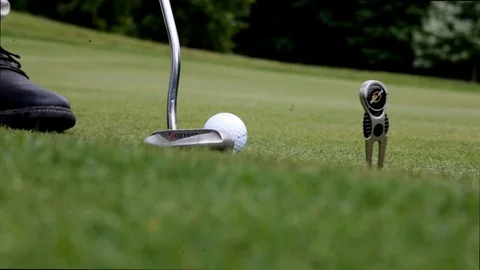 Playing golf Close enough putting ball Stock Footage 124825688