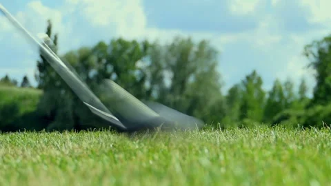 Playing golf. Golf course. Golf ball and club. Driver shot. Stock Footage 197337803