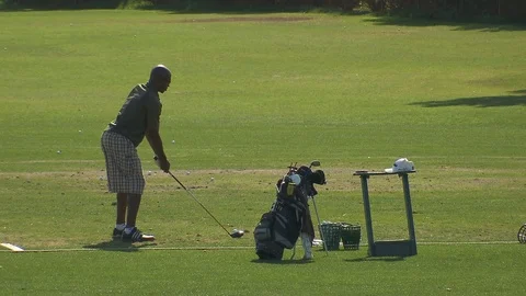 Playing golf in the Nevada desert Stock Footage 116339332