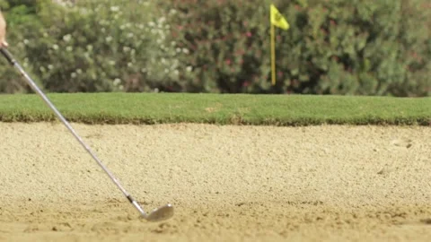 Playing golf out of the bunker Stock Footage 142222069
