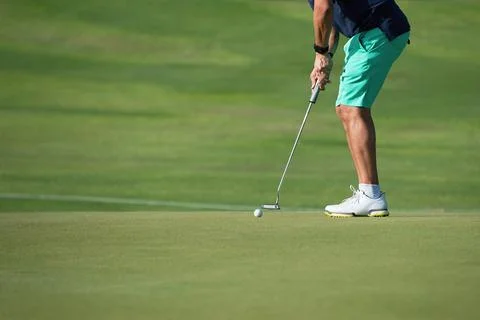 Playing golf preparing to shot Stock Photos
