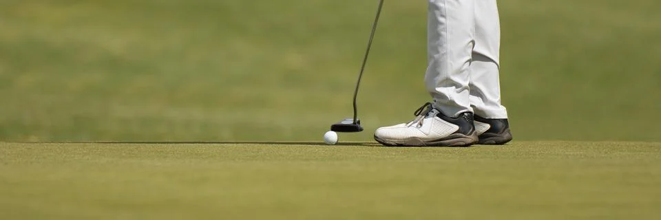 Playing golf preparing to shot Stock Photos