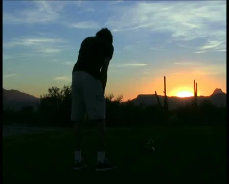 Playing golf V1 - PAL Stock Footage 12057328
