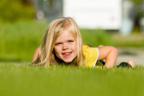 Playing in the grass Foto stock