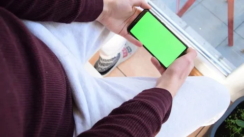 Playing on the green screen Stock Footage 129767956