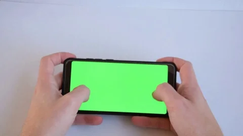 Playing on the green screen Stock Footage 129767959