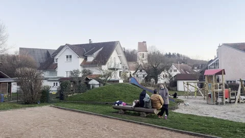 A playing ground in Holzen in the evening Stockbeeldmateriaal 333527114