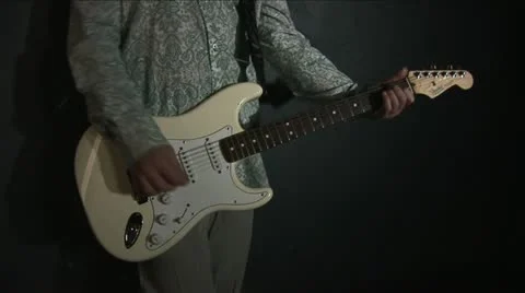 Playing the guitar 1 Stock-Footage 12697335