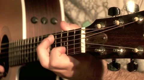 Playing on the Guitar 11 Stock Footage 10904678
