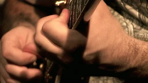 Playing on the Guitar 13 Stock Footage 10905195