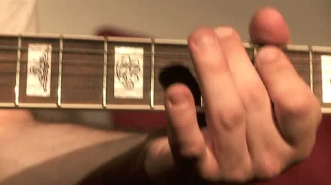 Playing on the Guitar 15 Stock Footage 10905314