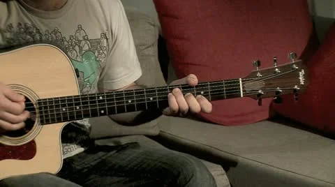 Playing on the Guitar 17 Stock Footage 10905721