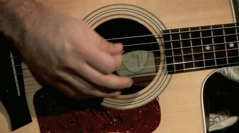 Playing on the Guitar 2 Stock Footage 10903879