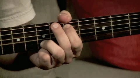 Playing on the Guitar 3 Stock Footage 10903887