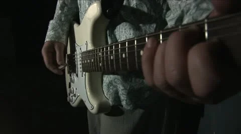 Playing the guitar 3 Stock Footage 12697620