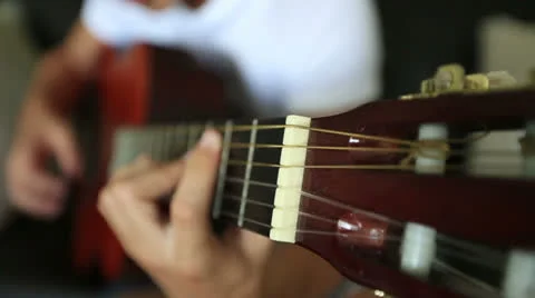 Playing guitar 5 Stock Footage 25423640